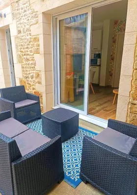 Coin salon dans l'établissement Le Rez des Arcades - T2 en RDC hypercentre