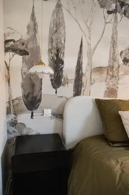 Un ou plusieurs lits dans un hébergement de l'établissement Maison-jardin-MontSaintMichel-Idéal pro et familles