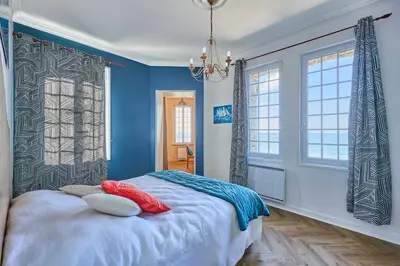 Un ou plusieurs lits dans un hébergement de l'établissement Le Château Rêvé - Superbe appt vue mer