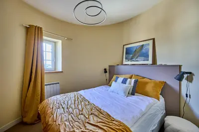 Un ou plusieurs lits dans un hébergement de l'établissement Le Château Rêvé - Superbe appt vue mer