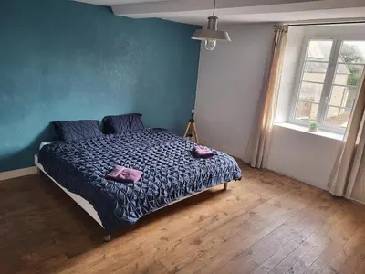 Un ou plusieurs lits dans un hébergement de l'établissement lefevre cottage, Landing beaches house