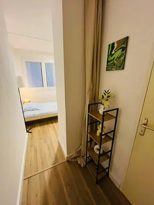 Un ou plusieurs lits dans un hébergement de l'établissement Studio cosy près du centre Nordblue