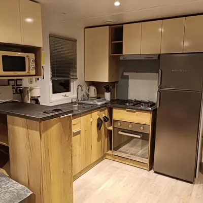Cuisine ou kitchenette dans l'établissement Les Ch'tis Normands 2!