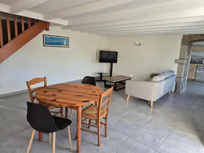 Télévision ou salle de divertissement dans l'établissement Maison 3 chambres