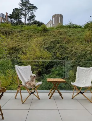 Jardin de l'établissement Appartement calme et lumineux au cœur de Carteret