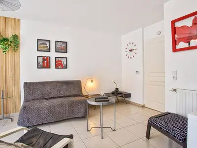 Coin salon dans l'établissement Refuge calme près de la plage et du golf à Cabourg, animaux admis, pour 4 personnes - FR-1-788-92