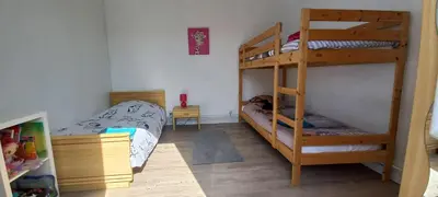 Un ou plusieurs lits superposés dans un hébergement de l'établissement maison 5 pers - 400 m de la plage - sword beach - 4 vélos