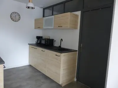 Cuisine ou kitchenette dans l'établissement Appartement cozy