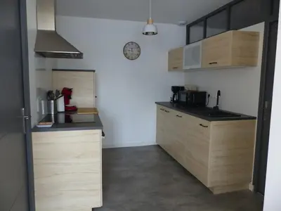 Cuisine ou kitchenette dans l'établissement Appartement cozy