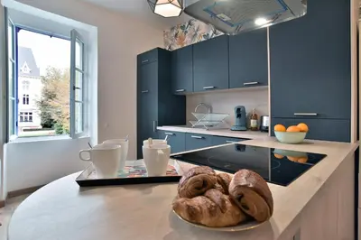 Cuisine ou kitchenette dans l'établissement La plage du Verger