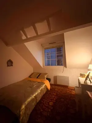 Un ou plusieurs lits dans un hébergement de l'établissement TheGarrisonLoft