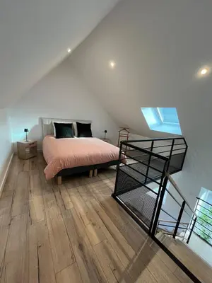 Un ou plusieurs lits dans un hébergement de l'établissement La petite maison