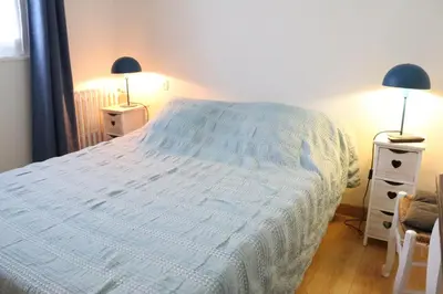 Un ou plusieurs lits dans un hébergement de l'établissement Les Chambres de Catherine
