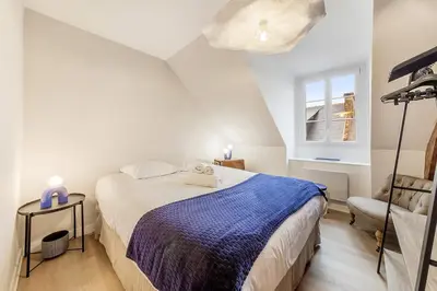 Un ou plusieurs lits dans un hébergement de l'établissement Armor beautiful renovated apartment 2 bedrooms