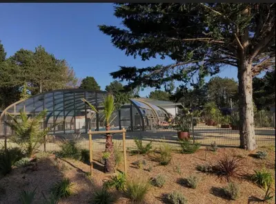 Jardin de l'établissement Le Cottage de Laura Jullouville 6 pers
