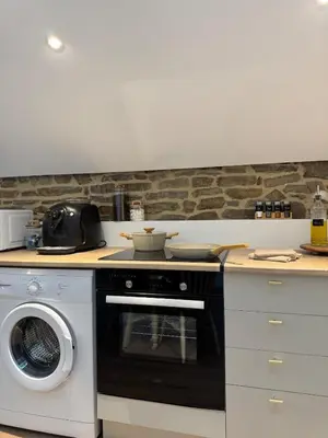 Cuisine ou kitchenette dans l'établissement Le Grenier d'Antan - Near Mont-Saint-Michel