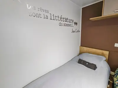 Un ou plusieurs lits dans un hébergement de l'établissement Séjour convivial en pleine nature