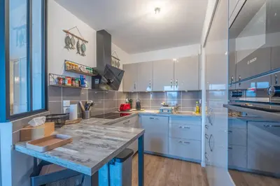 Cuisine ou kitchenette dans l'établissement Appartement Tulipe - Welkeys