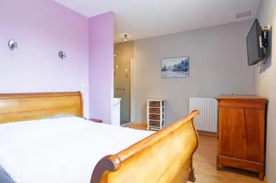 Un ou plusieurs lits dans un hébergement de l'établissement Le Dérochoir - Avec jardin