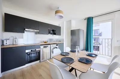 Cuisine ou kitchenette dans l'établissement Entre Ciel et Mer - Proche Plage