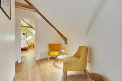 Coin salon dans l'établissement Le Cottage du Bessin - Proximité historique - Bayeux