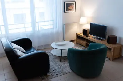 Télévision ou salle de divertissement dans l'établissement Scamaroni Caen