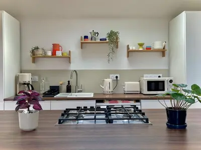 Cuisine ou kitchenette dans l'établissement La Maison Rose - Ciel by Melrose