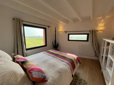 Un ou plusieurs lits dans un hébergement de l'établissement La Maison Rose - Ciel by Melrose