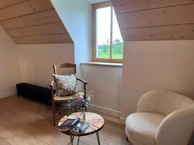 Coin salon dans l'établissement Cottage avec Piscine et Jacuzzi - Normandie