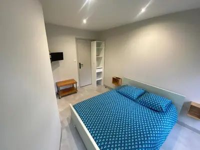 Un ou plusieurs lits dans un hébergement de l'établissement Appartement cosy à Cherbourg-en-Cotentin, 20 m² avec confort.