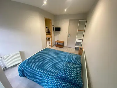 Un ou plusieurs lits dans un hébergement de l'établissement Appartement cosy à Cherbourg-en-Cotentin, 20 m² avec confort.