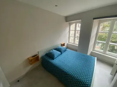 Un ou plusieurs lits dans un hébergement de l'établissement Appartement cosy à Cherbourg-en-Cotentin, 20 m² avec confort.