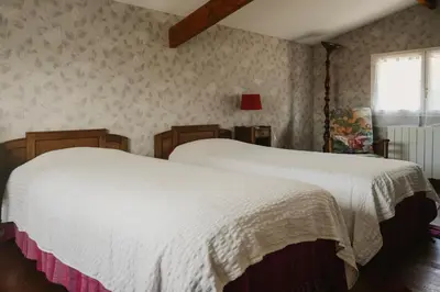 Un ou plusieurs lits dans un hébergement de l'établissement Gîte Les Fresnes