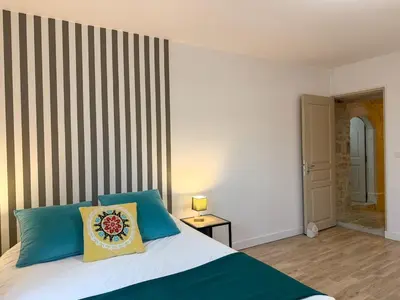 Un ou plusieurs lits dans un hébergement de l'établissement Maison - La Pierre de Valognes - à 4 min de la gare
