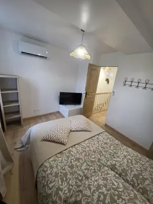 Un ou plusieurs lits dans un hébergement de l'établissement Maison Marceau