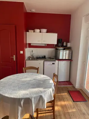 Cuisine ou kitchenette dans l'établissement Le Fil du Temps