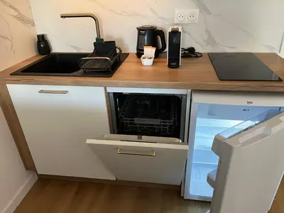 Cuisine ou kitchenette dans l'établissement Carteret centre, port avec balcon vue mer