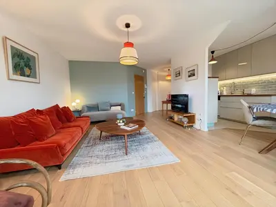 Télévision ou salle de divertissement dans l'établissement Résidence calme avec balcon privé & vue sur Caen
