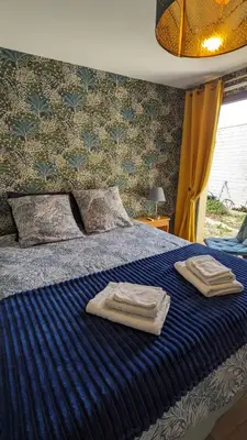 Un ou plusieurs lits dans un hébergement de l'établissement Maison moderne de plain-pied proche de la mer