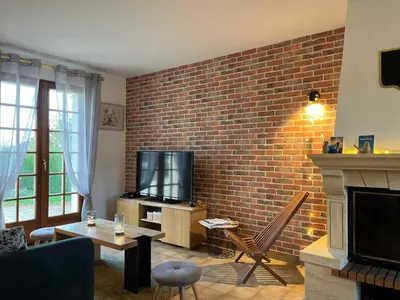 Télévision ou salle de divertissement dans l'établissement Le Repos de Sainte mere - House near the center