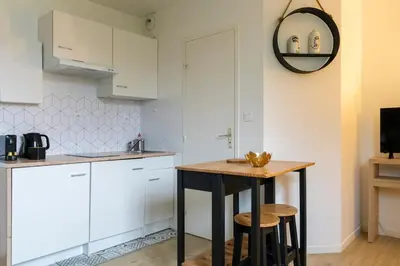 Cuisine ou kitchenette dans l'établissement Joli studio proche tram & université