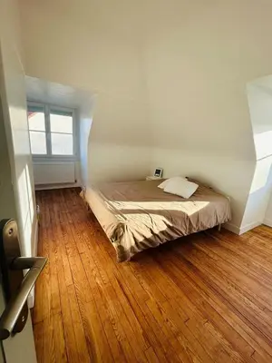Un ou plusieurs lits dans un hébergement de l'établissement Maison à la Campagne