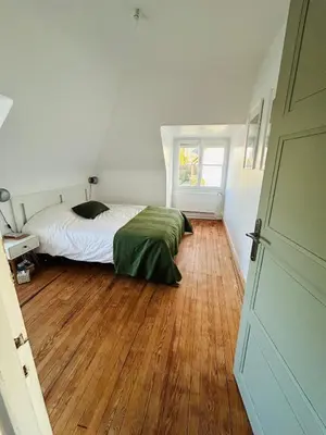 Un ou plusieurs lits dans un hébergement de l'établissement Maison à la Campagne