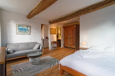Un ou plusieurs lits dans un hébergement de l'établissement Le Cosy de la Rue Froide - Centre Historique