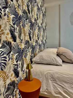 Un ou plusieurs lits dans un hébergement de l'établissement Appartement lumineux avec vue sur les clochers