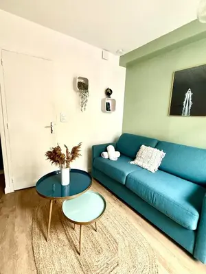 Coin salon dans l'établissement Studio stationnement gratuit - accès indépendant
