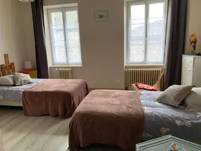 Un ou plusieurs lits dans un hébergement de l'établissement La Capitainerie 4 chambres