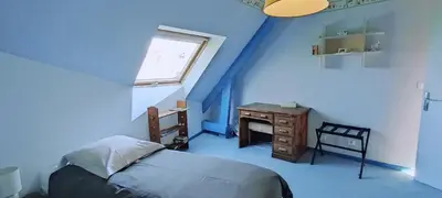 Un ou plusieurs lits dans un hébergement de l'établissement La Villa du Manoir