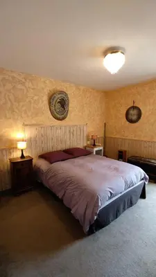 Un ou plusieurs lits dans un hébergement de l'établissement La Villa du Manoir