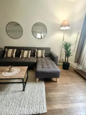 Coin salon dans l'établissement Le Nid De Demolombe
